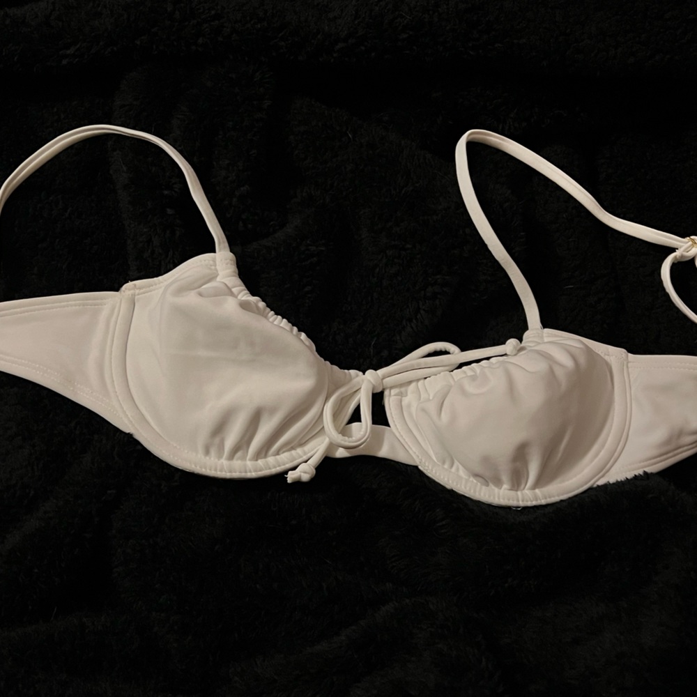 This is a small white bathing suit top, from xhilaration, this is new